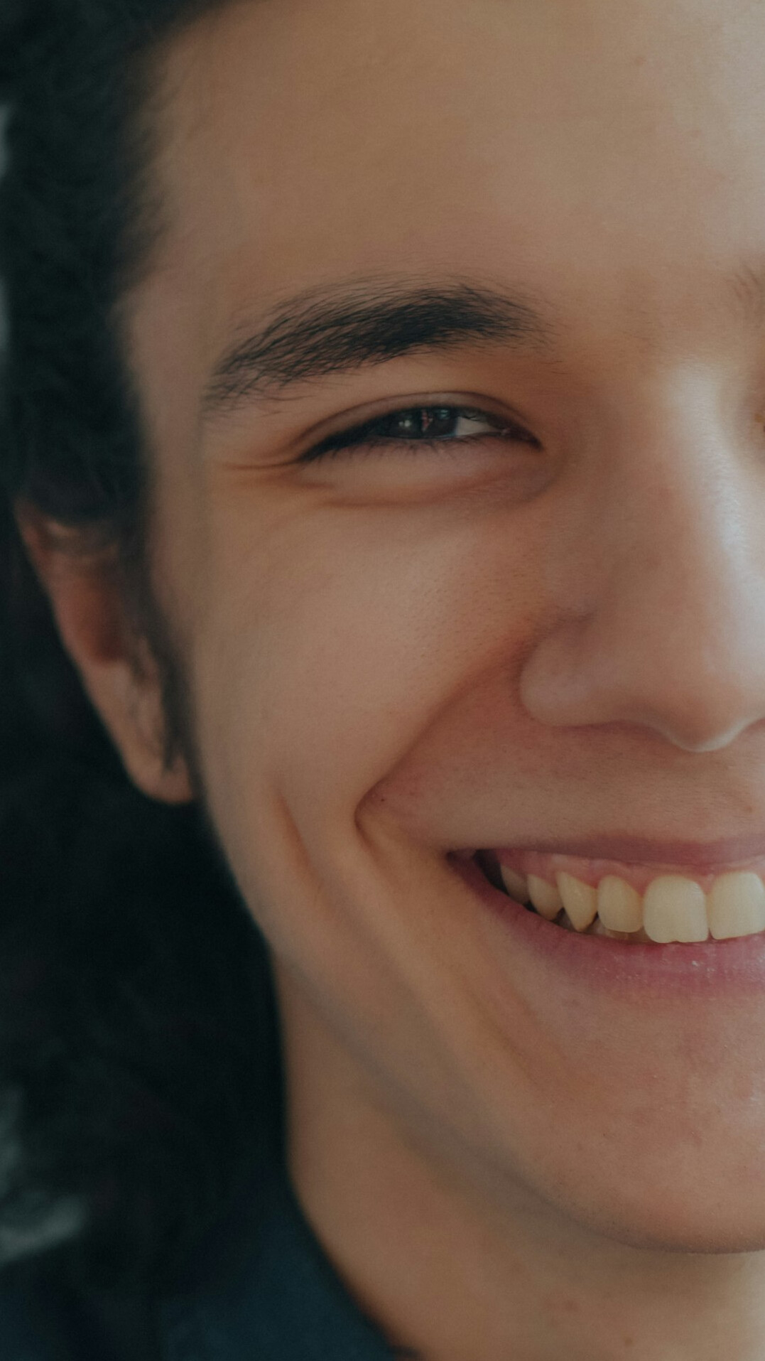 sinister smile closeup