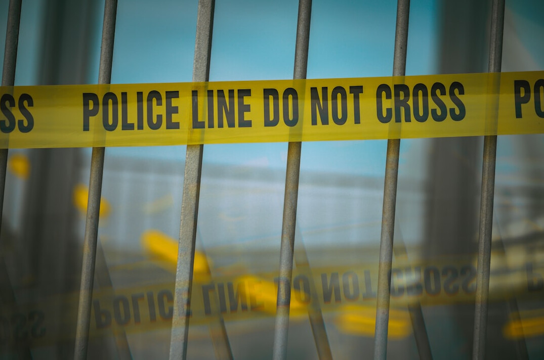 detective investigating crime scene