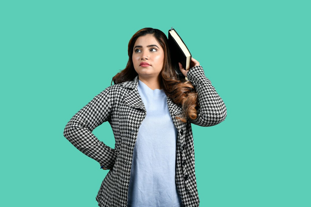 surprised reader with book