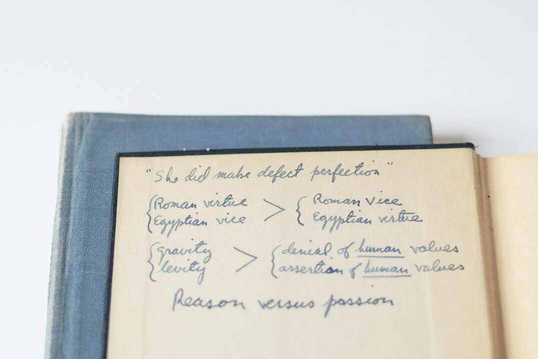 open book with handwritten notes